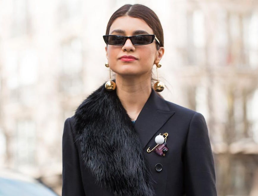 clothing apparel person sunglasses accessories coat blazer jacket overcoat female