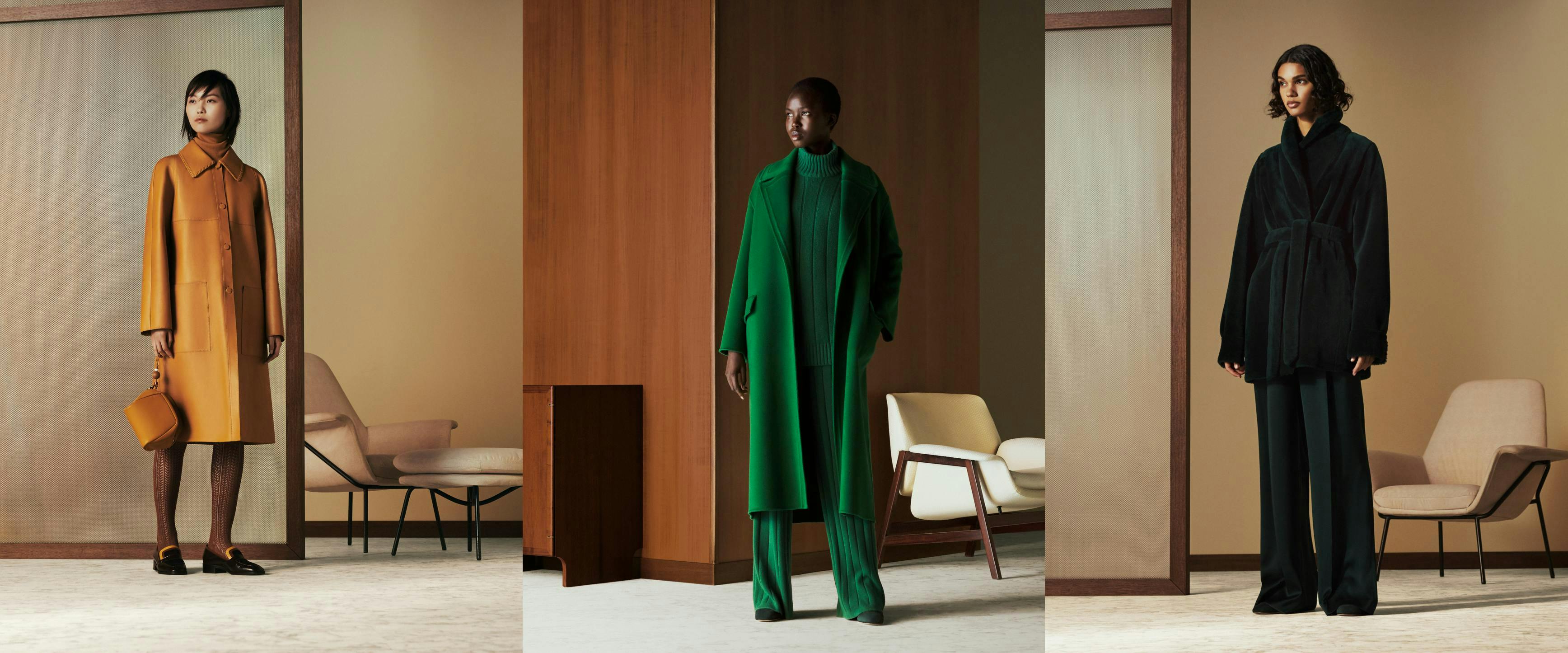 clothing apparel flooring person human chair furniture overcoat coat floor