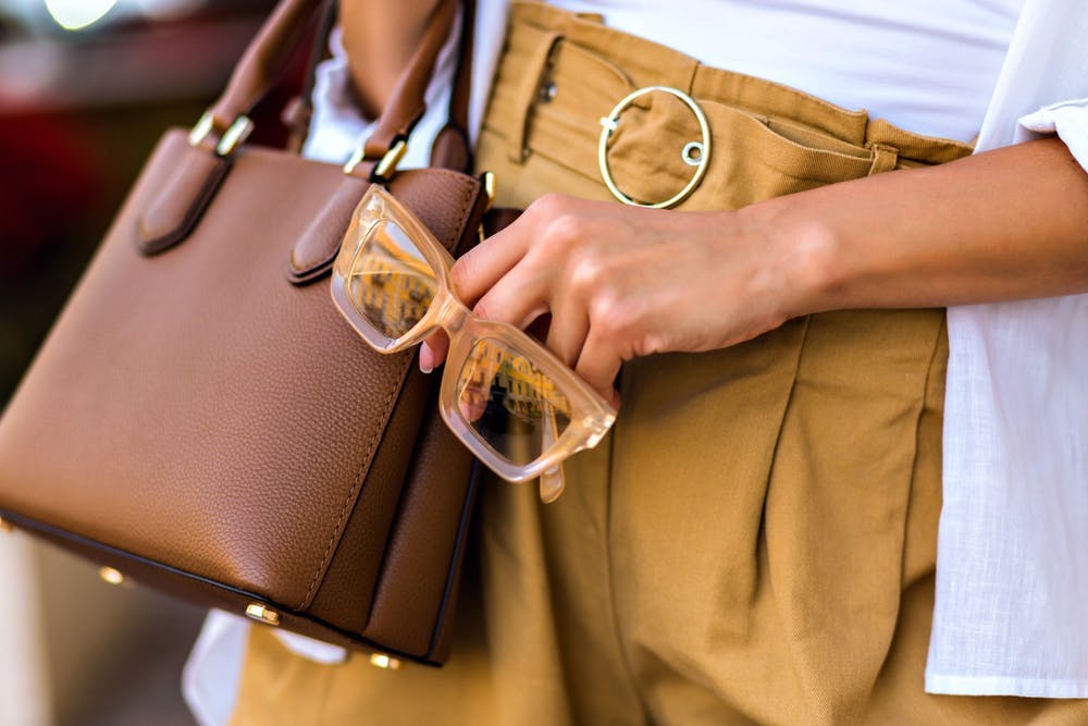 beauty,caucasian,bag,beautiful,outfit,trendy,casual,copy space,golden,details,businesswoman,female,shopping,sunglasses,girl,glamour,fashionable,leather,closeup,background,person,vintage,style,detail,women,young,hipster,holding,fall,street,design,linen,elegant,business,accessories,black,warm colors,people,clothes,beige,stylish,elegance,handbag,sale,jewellery,outdoors,lady,luxury,purse,fashion accessories bag handbag purse glasses