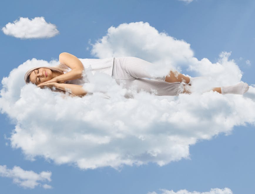 Woman sleeps on a cloud