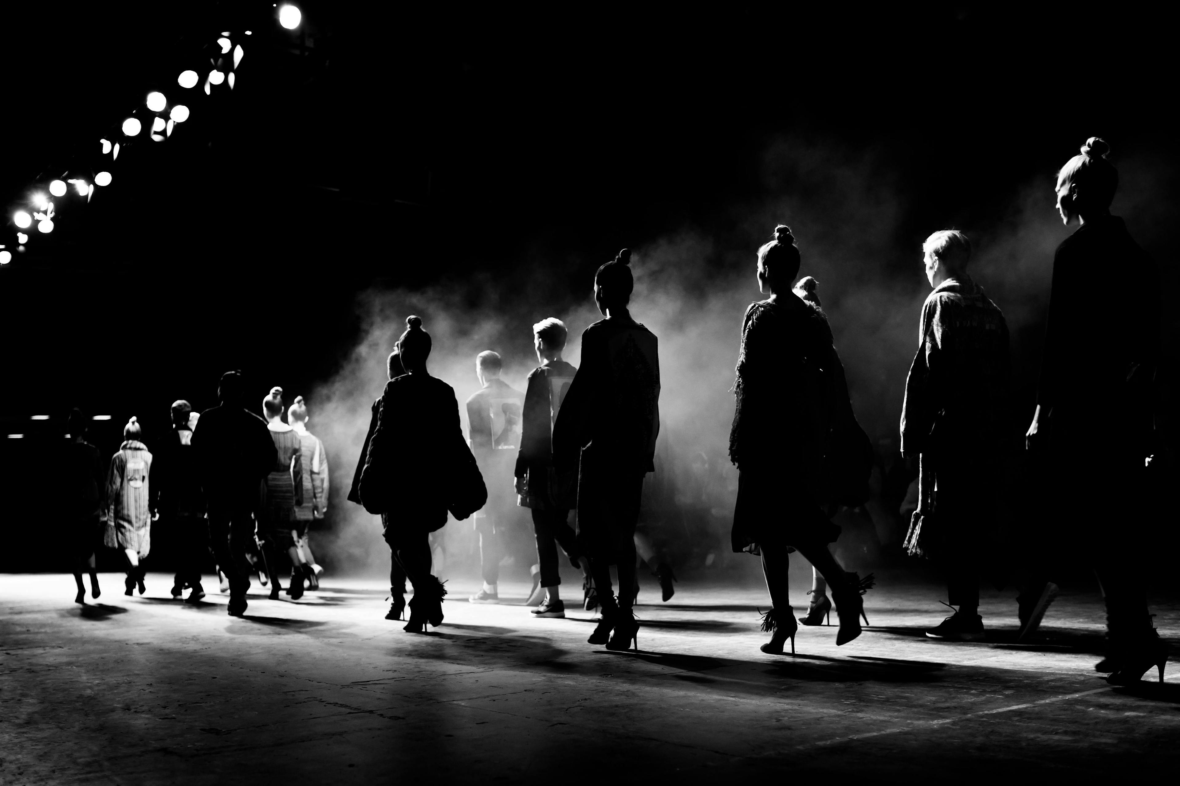 dress,unrecognizable,london,beauty,beautiful,cast,trendy,white,model,female,models,finale,runway,collection,fashionable,look,silhouettes,background,catwalk,style,adult,week,woman,fashion week,fashion model,show,industry,milan,modern,design,casting,event,elegant,couture,black,milano,italian,designer,people,clothes,fashion catwalk,call,stylish,elegance,stage,york,posing,walk,fashion person walking people coat silhouette adult male man lighting shoe