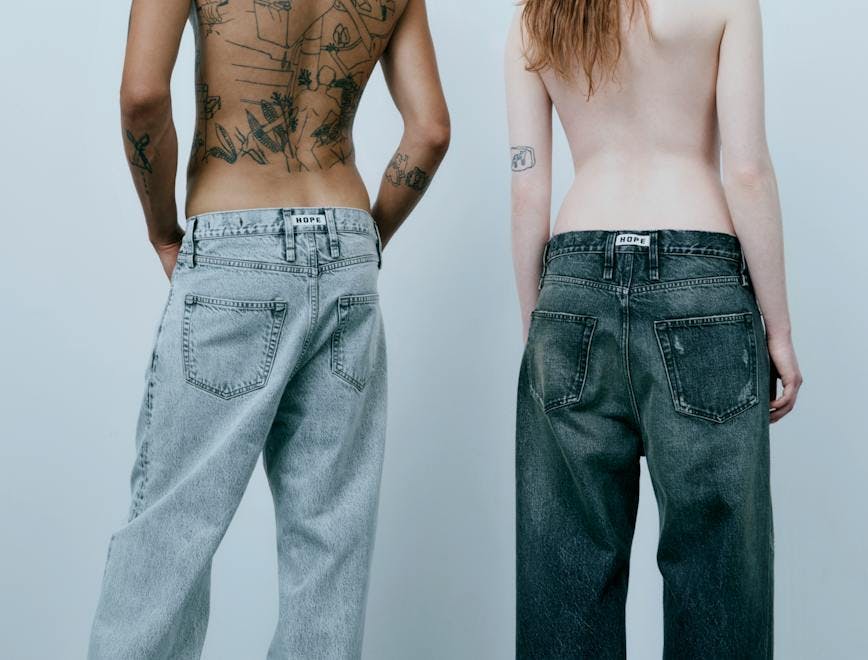 clothing pants back body part person jeans skin tattoo