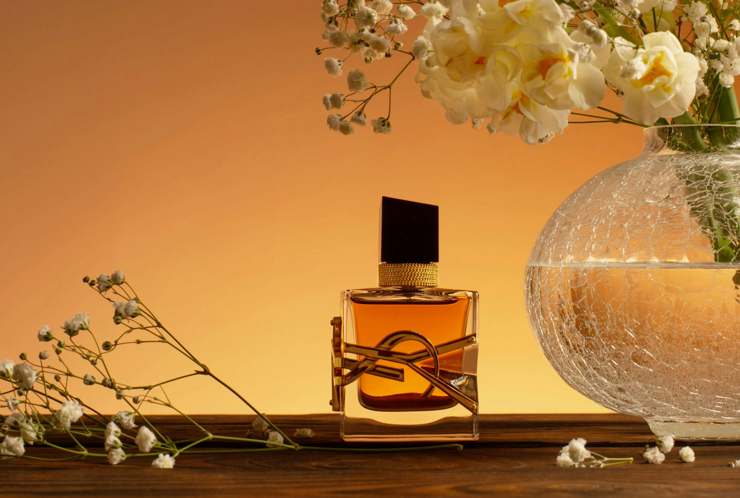 container,fragrant,beauty,illustrative editorial,vase,smell,spring,ysl perfume,ysl,parfum,golden,scent,logo,cosmetic,female,brand,intense,flowers,glass,spray,bouquet,glamour,edp,closeup,light,background,yellow,bottle,perfume,gold,gypsophila,yves saint laurent,design,libre,elegant,table,editorial,accord,designer,narcissus,fragrance,elegance,liquid,perfumery,perfume bottle,wooden,luxury,daffodils,aroma,fashion flower flower arrangement plant bottle cosmetics perfume petal ikebana
