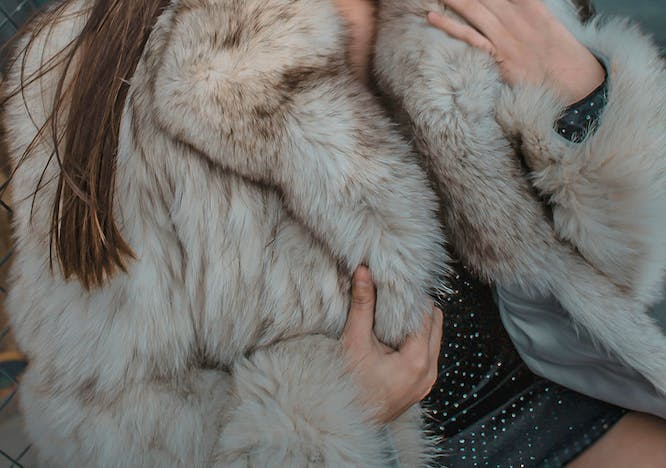 clothing coat fur adult female person woman dog mammal pet
