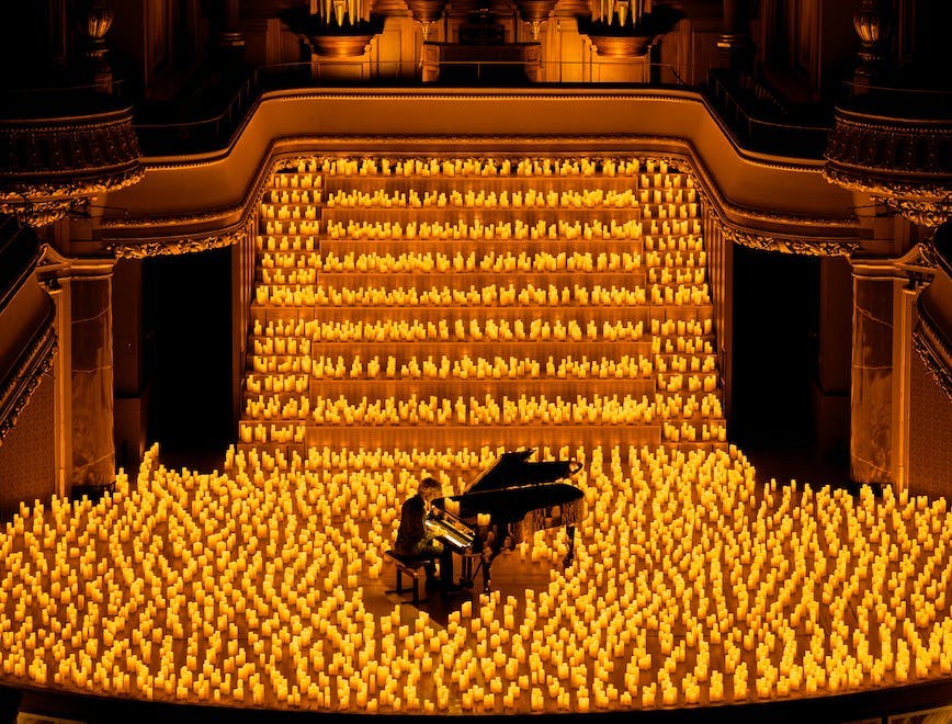 keyboard musical instrument piano person architecture building auditorium theater bench furniture
