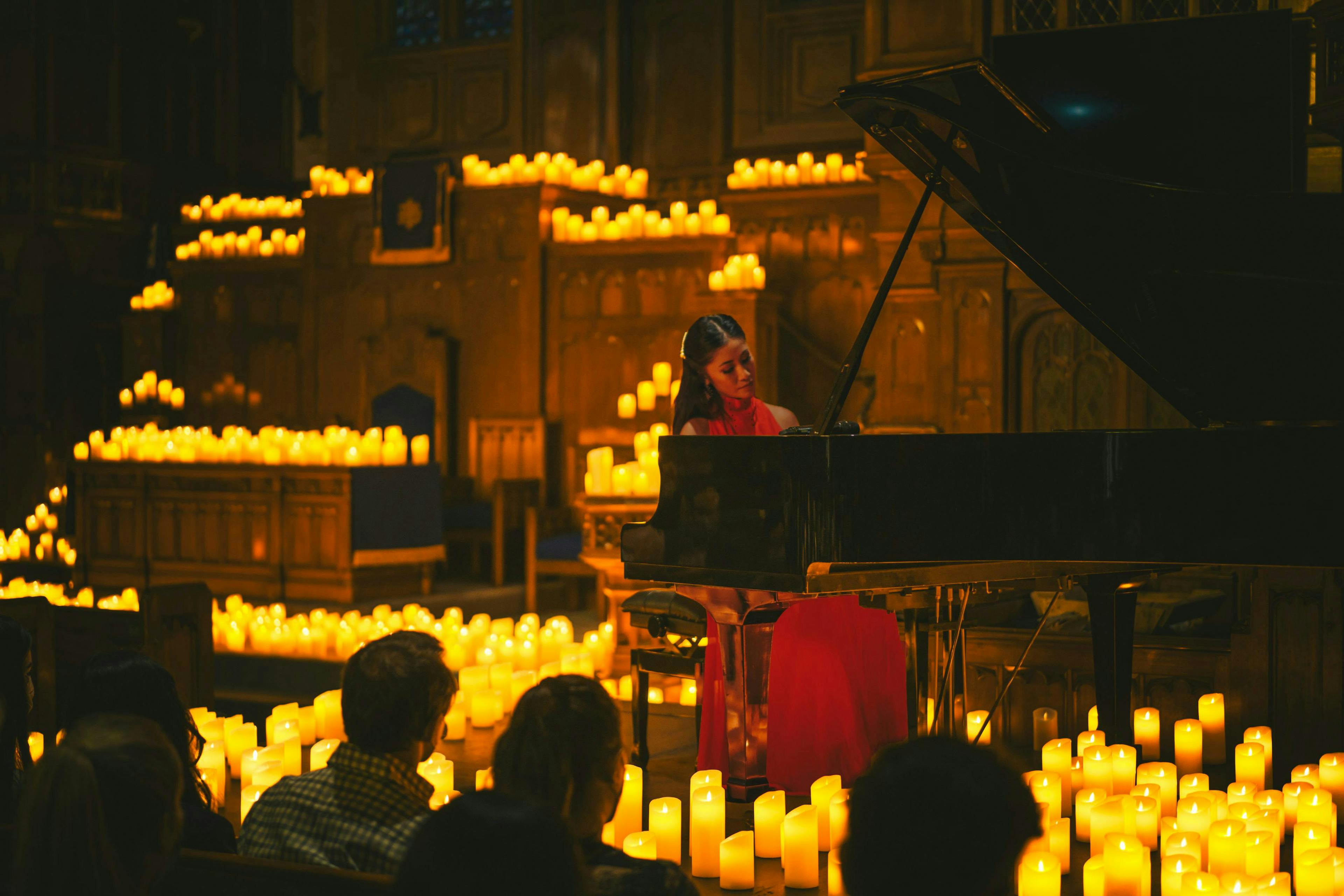adult female person woman musical instrument piano male man hanukkah menorah candle